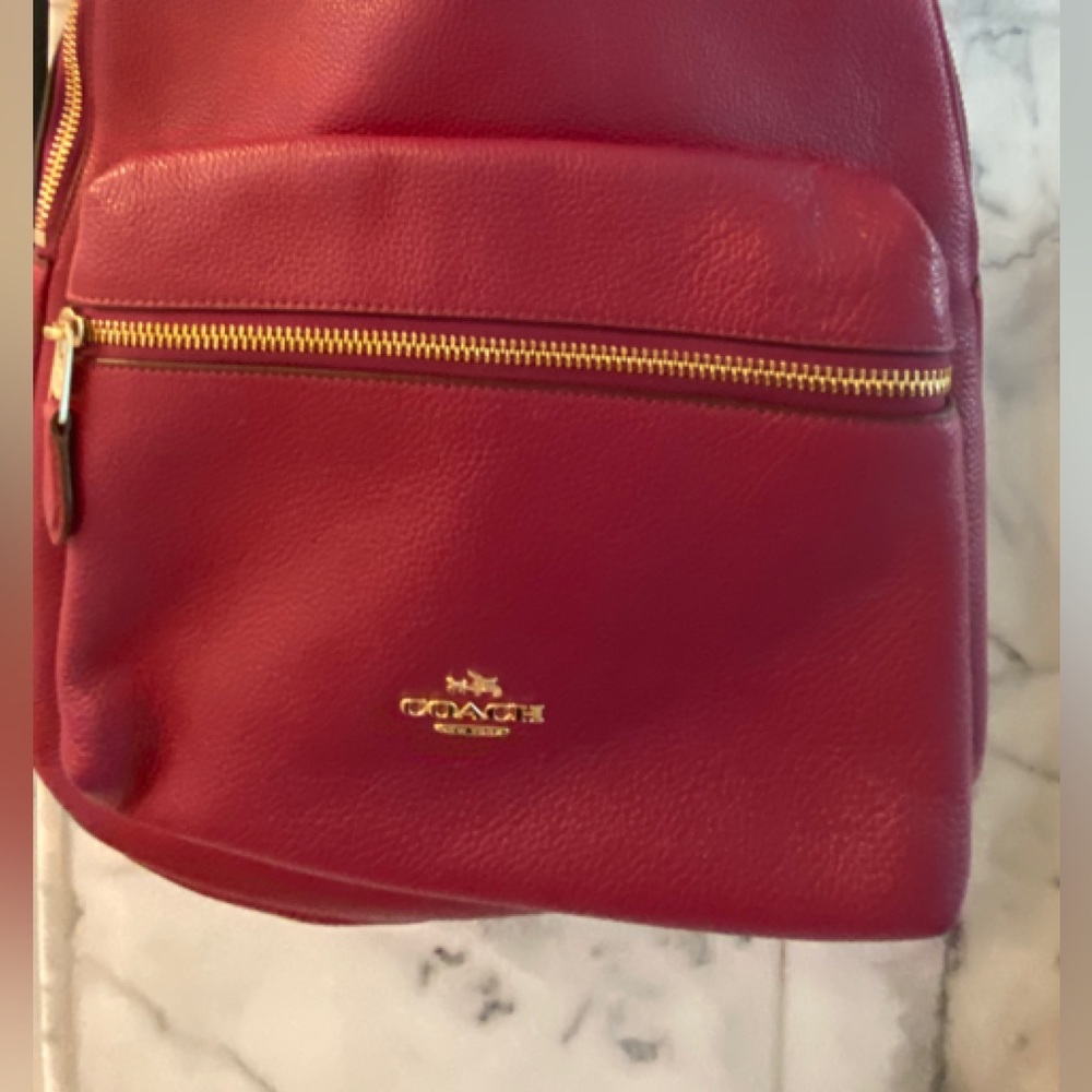 Coach fuschia leather backpack